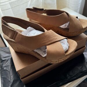 Clarks sandals with Velcro straps, women’s size 7.5 (Used)